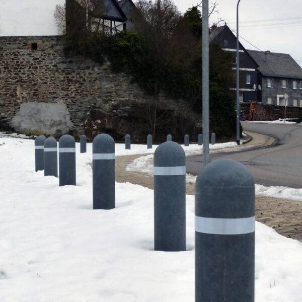 Recycled Plastic Dome Head Street Bollards in the snow