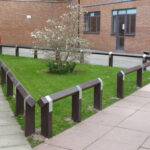 Knee Rail Fencing around a garden made with recycled plastic